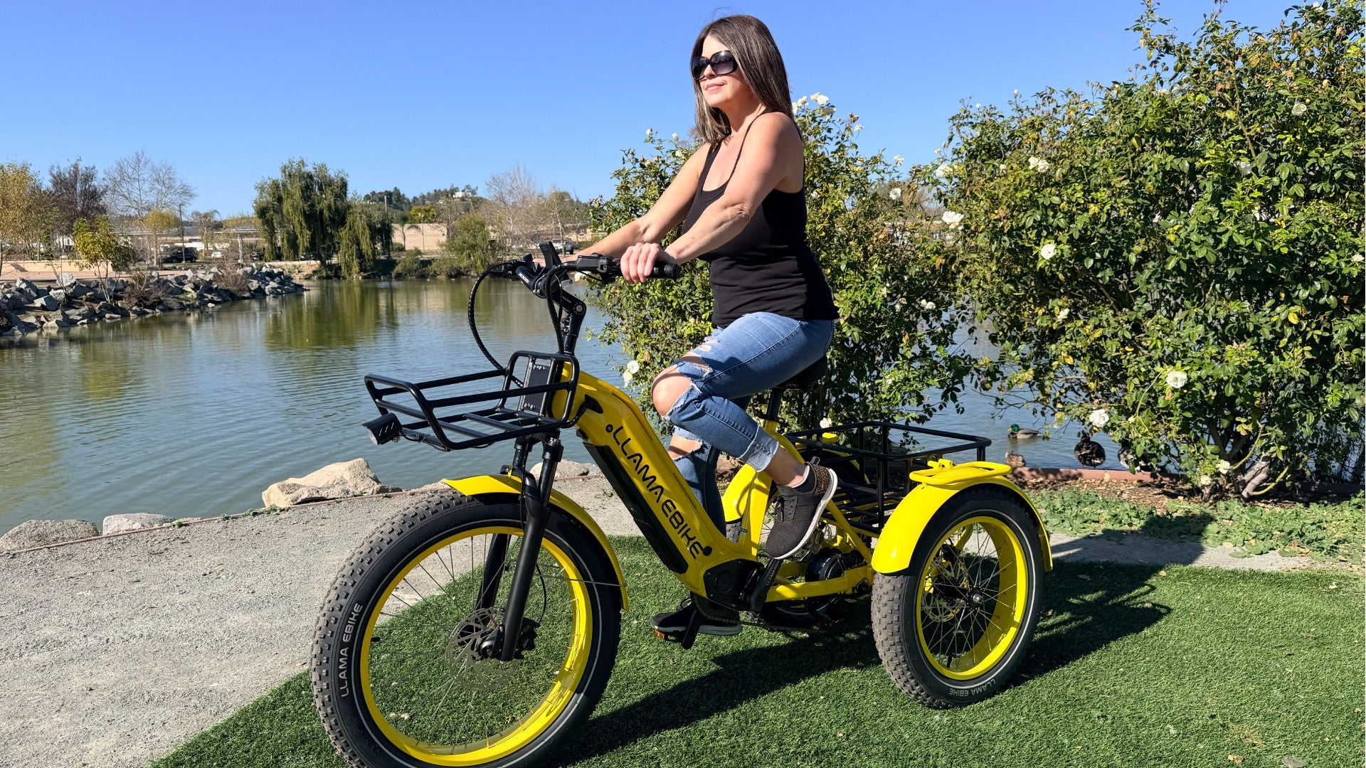 Load video: A detailed video of the Llama Trike CT10, showing frame, fat tires, rear seat, and components, along with real riding on paved roads.